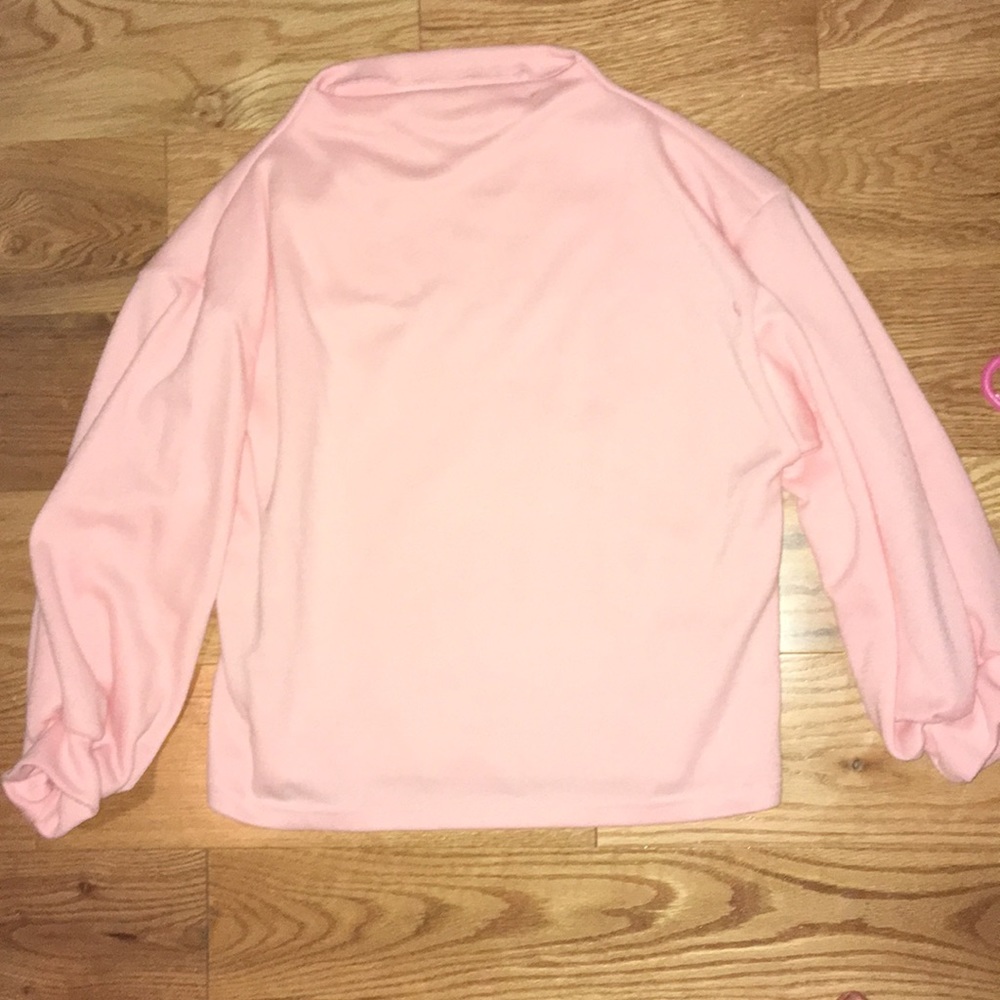 light pink 80’s style turtleneck